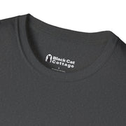 Close-up of the collar on a dark gray FAFO IYKYK Gritty men's t-shirt by Printify, showing a printed inner label with the brand name, cat logo, and size L.