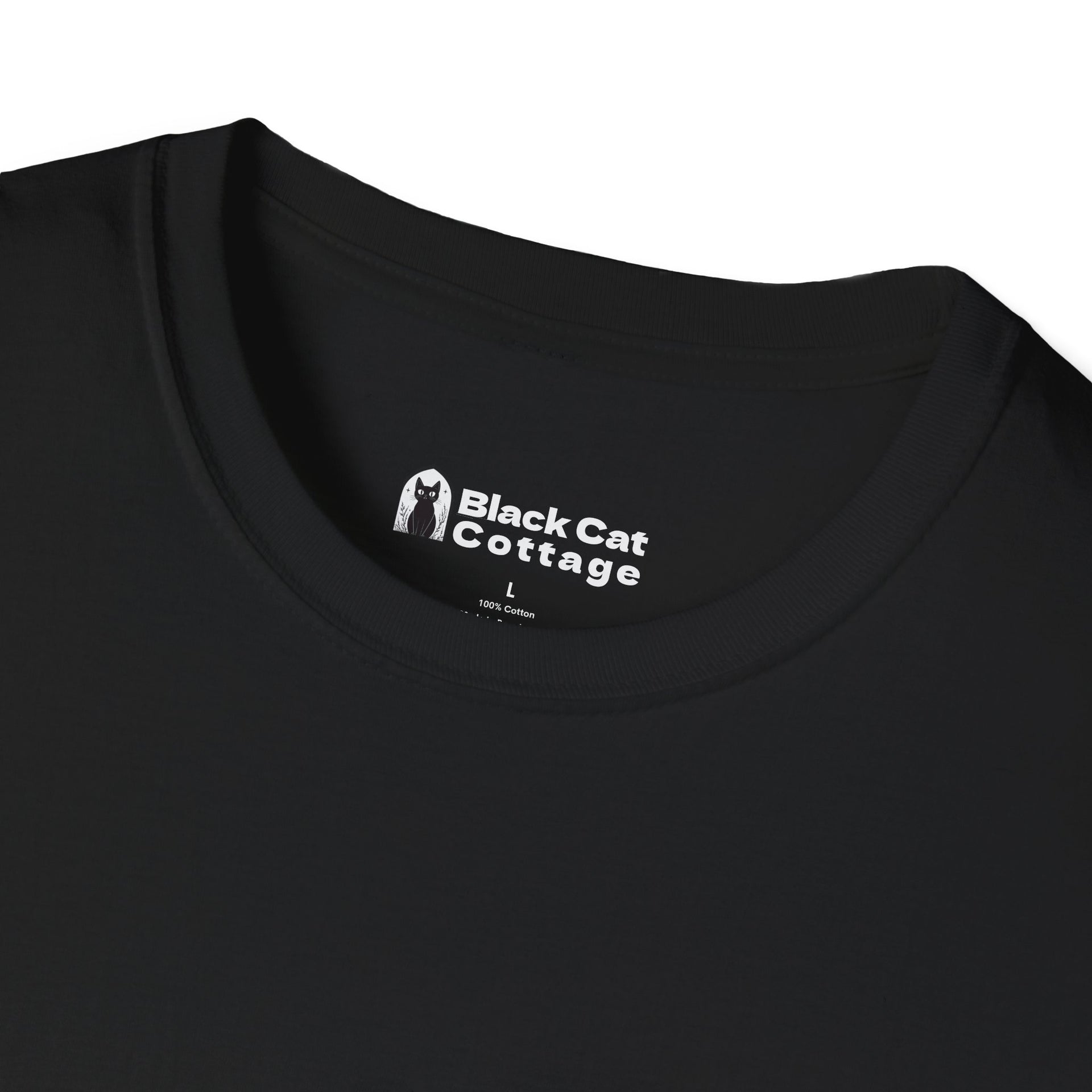 Close-up of a black Printify FAFO IYKYK Gritty men's t-shirt collar featuring a printed label and a simple black cat graphic.